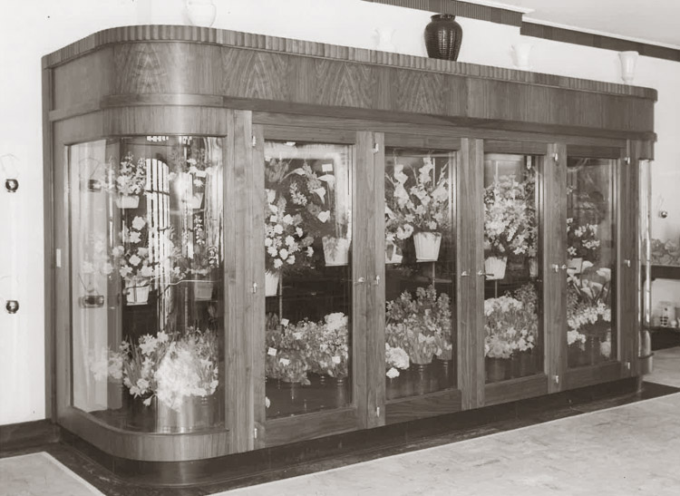 An early refrigerated cooler from the mid-20th century keeps our stock looking fresh